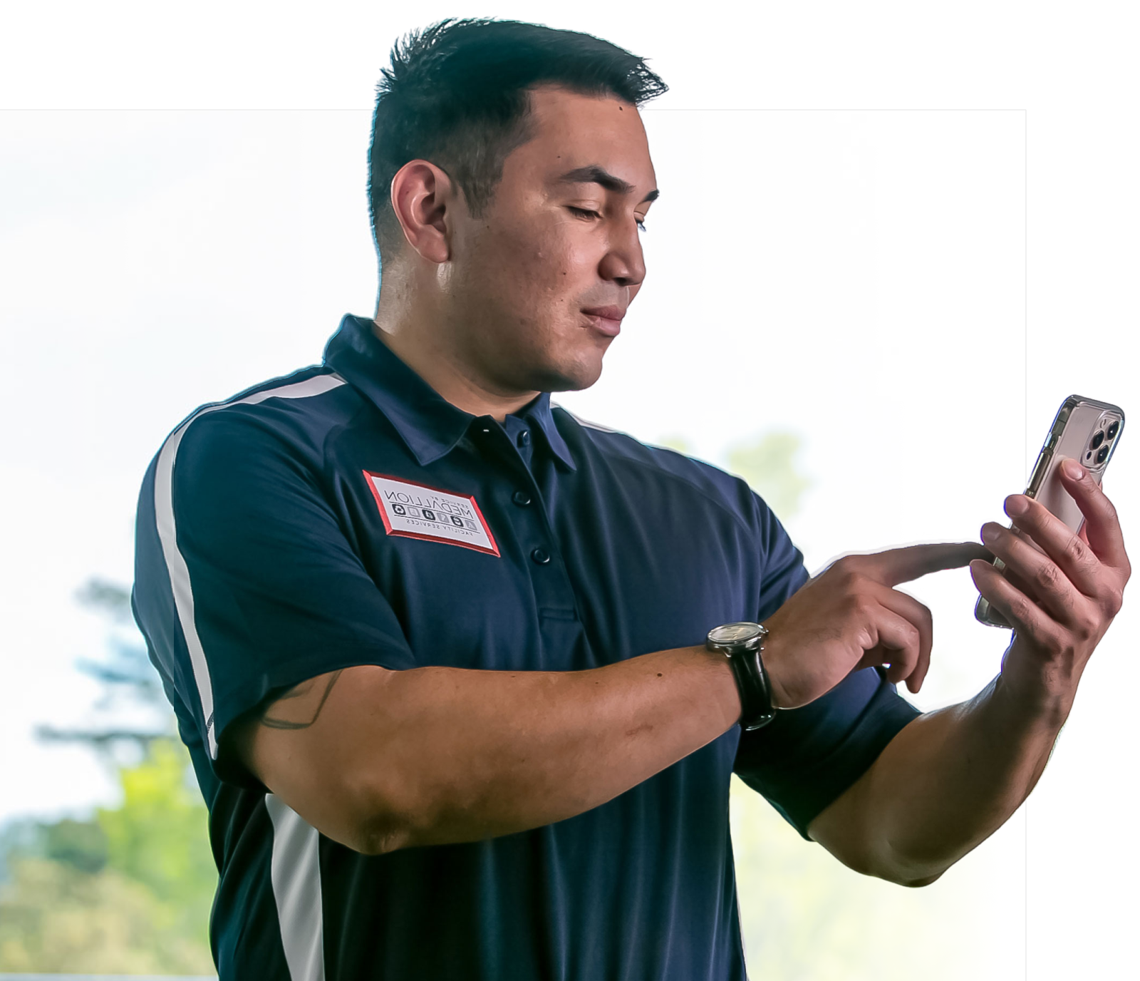 Service by Medallion supervisor typing on mobile device