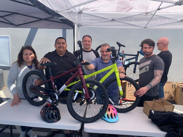 Service by Medallion corporate employees at a bike building volunteer day