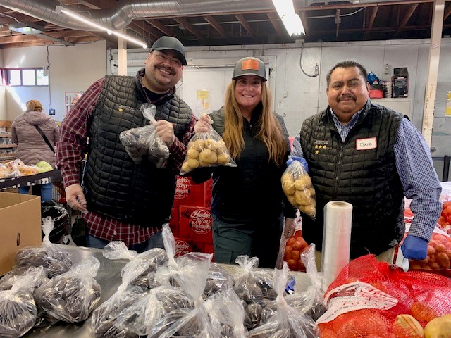 Service by Medallion team members serving the Bay Area community at a food bank