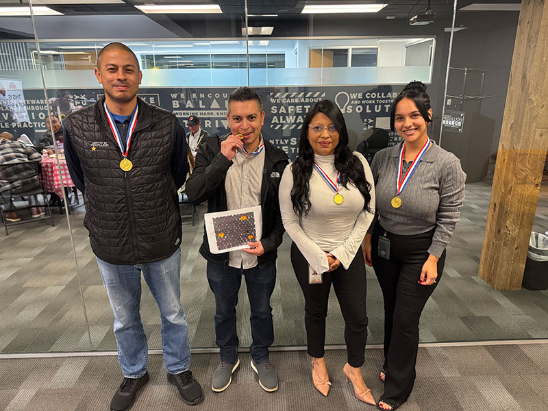 Service by Medallion Bay Area corporate headquarters staff celebrating a team win